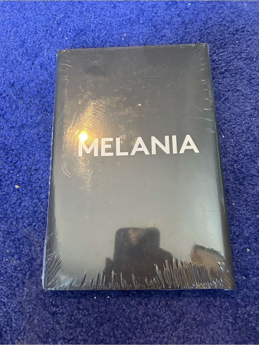 MELANIA Black Box with Bold White Logo